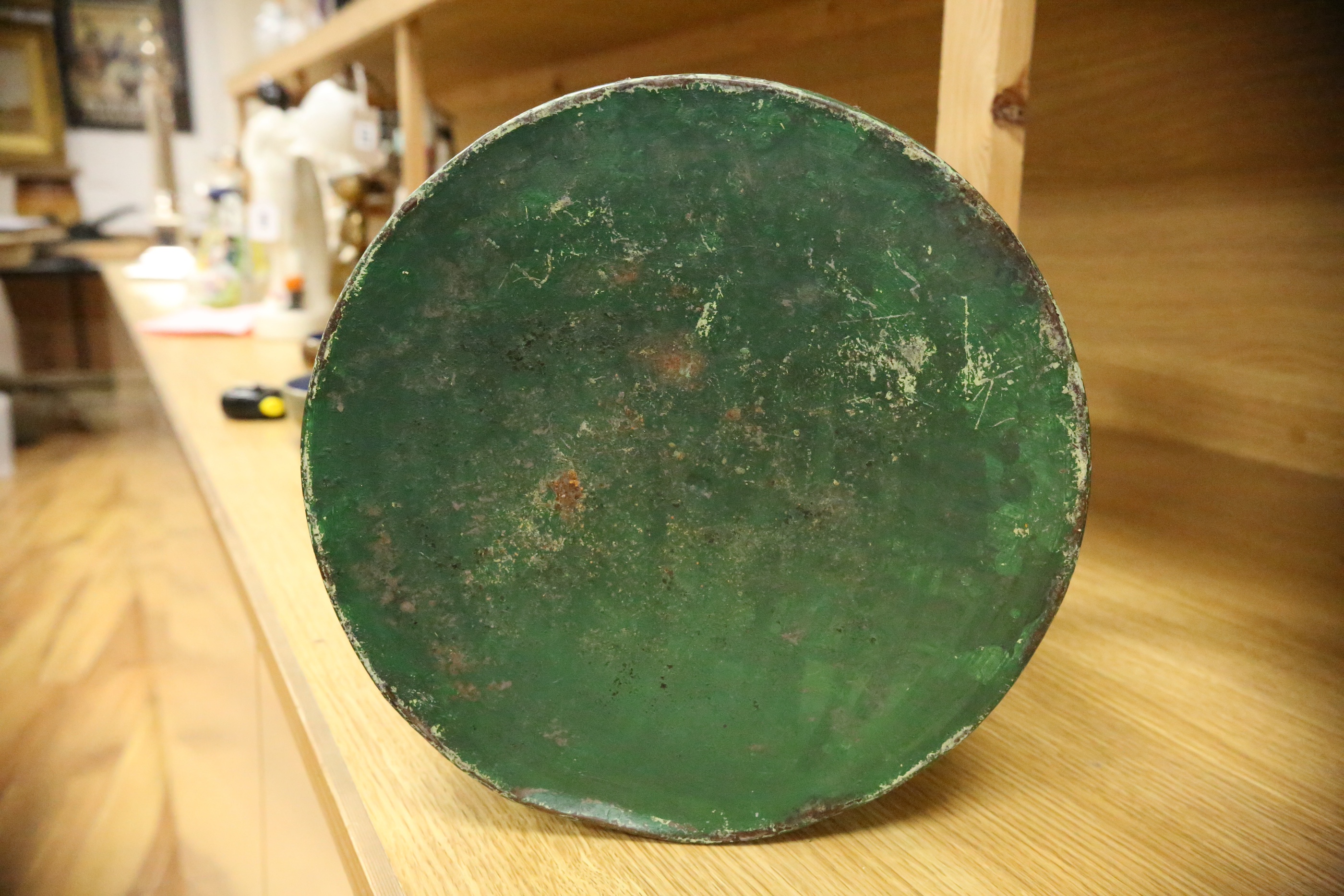 A green toleware floral decorated tea canister, 42cm high. Condition - poor, many chips to surface paint